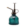 Wholesale Luxury Glass Watering Spray Bottle with Plastic Bronze Plastic Top Pump